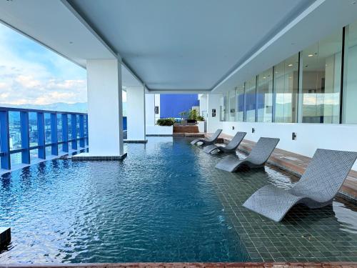 38 Park Ave Studio in IT Park with Netflix, Pool & Gym