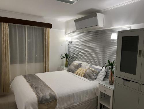 Stunning 2BR apt, 65 sq m Netflix at Rosewood Pointe Residences near BGC