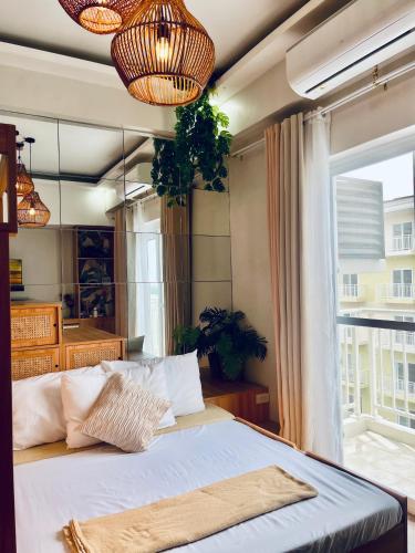 Modern Studio 4 Minutes from Mactan-Cebu Airport, Pool, Wi-Fi & Kitchen