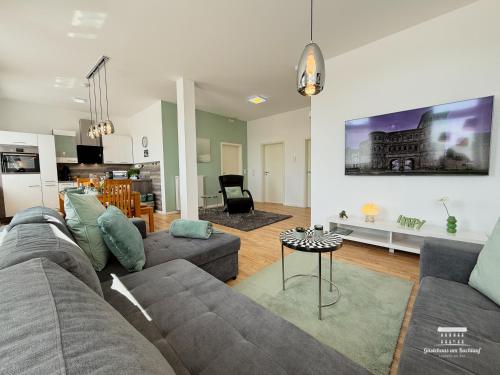 Komfort Ferienwohnungen mit Wellness-Garten - Gästehaus am Bachlauf - Losheim am See