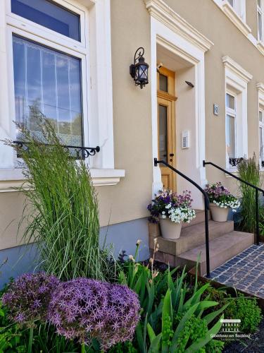 Komfort Ferienwohnungen mit Wellness-Garten - Gästehaus am Bachlauf - Losheim am See