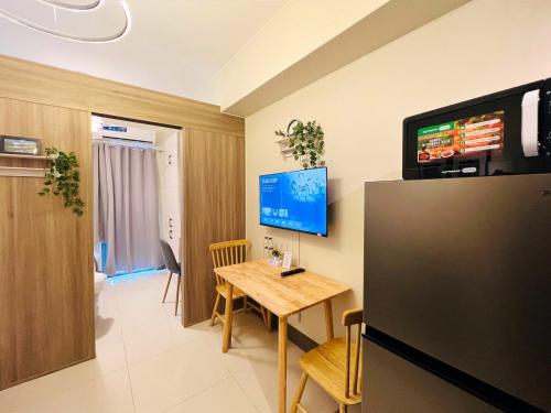 1BR Condotel with Balcony at FAME Residences #FM25-1