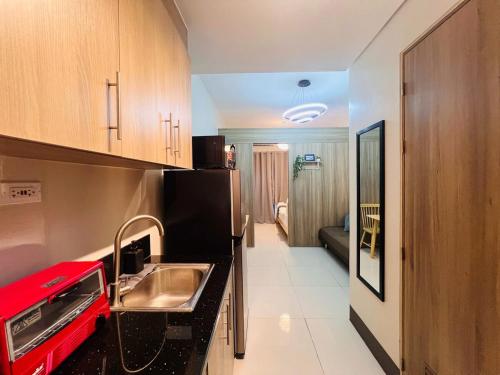 1BR Condotel with Balcony at FAME Residences #FM28-1