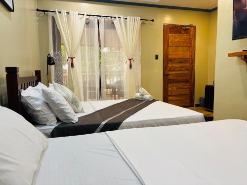 White Beach Front And Cottages