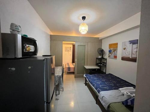 Shore Family suite TV&fast WiFi MOA near NAIA 9116