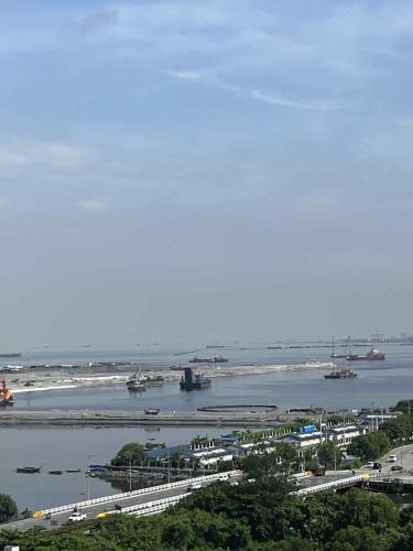 Cozy 2 Beds Near Mall of Asia