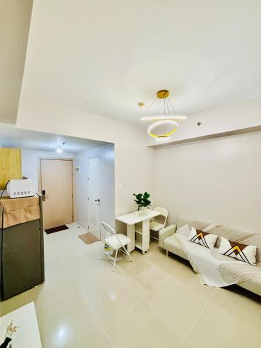 Cozy 1BR Condo at Grass Residences near SM North