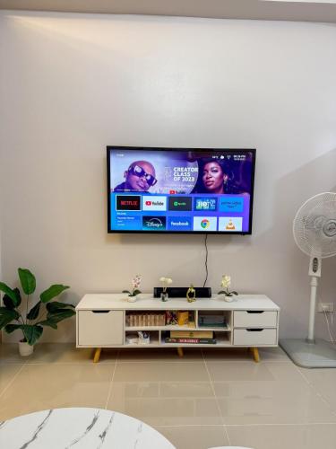 Cozy 1BR Condo at Grass Residences near SM North