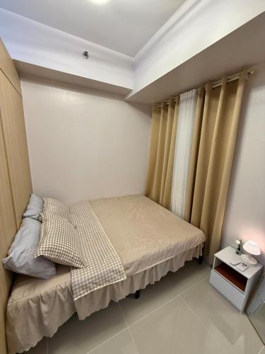 Cozy 1BR Condo at Grass Residences near SM North