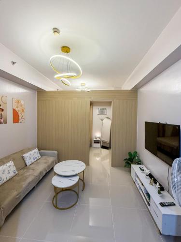 Cozy 1BR Condo at Grass Residences near SM North