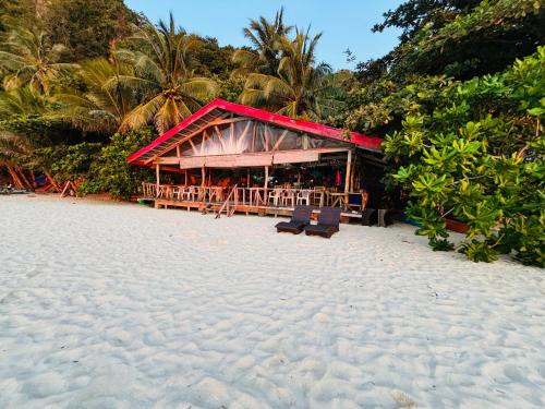 White Beach Front And Cottages