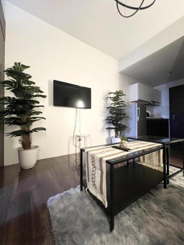 Iris Affordable and Neat Staycation at Air Residences Makati