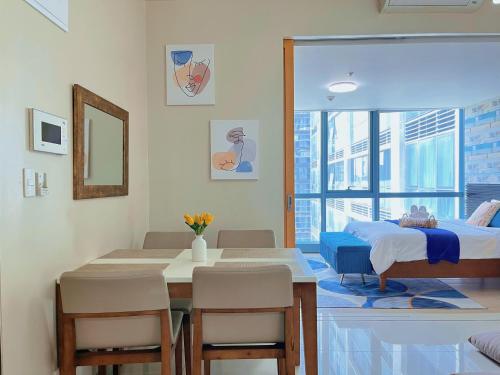 BGC Cozy Condo - Pool, Wi-Fi - Suite 17