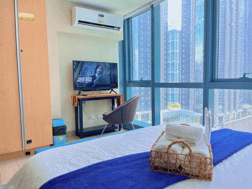 BGC Cozy Condo - Pool, Wi-Fi - Suite 17
