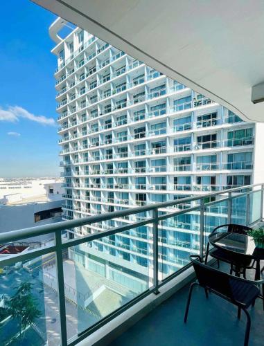 The Sunny Side at Azure with Pool and City View