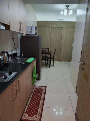 De Luxe, Standard and Studio Suites -The Breeze Residences-close to Airport, Mall of Asia, US Embassy