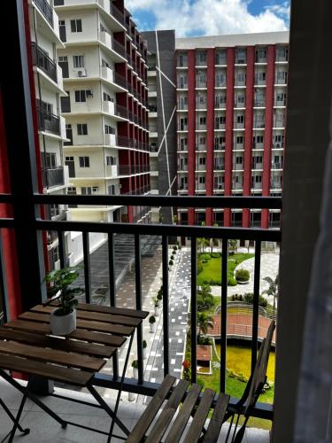 Dagos condo Primeworld with balcony and pool view