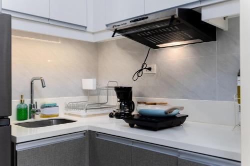 Uptown Palms 1BR Suite Fuente, Walk to CebuDoc