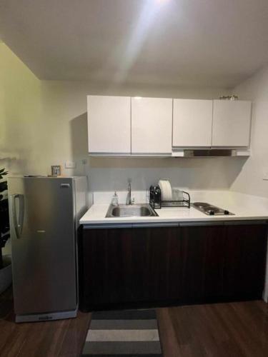 Iris Affordable and Neat Staycation at Air Residences Makati