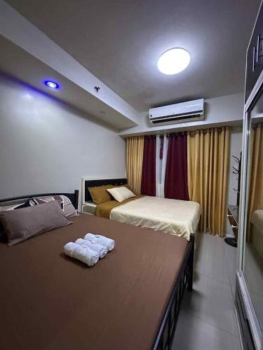 SD staycation Shell Residences facing moa complex