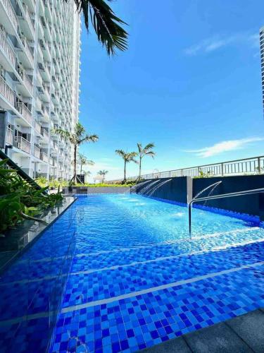 SMDC Coast Residences by Presto Real Estate Management near MOA, PICC, Star City and NAIA