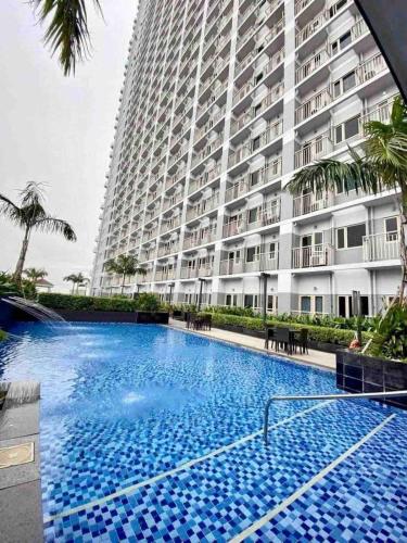 SMDC Coast Residences by Presto Real Estate Management near MOA, PICC, Star City and NAIA