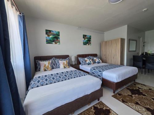 VERDANT by Vista Manors Deluxe Rooms with Balcony, Gym and Swimming Pool