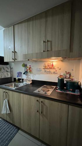 S Residence, 1bedroom with balcony, with own kitchen and washing machine, walking distance to Mall of Asia and near in Manila Airport, can cook and wash clothes