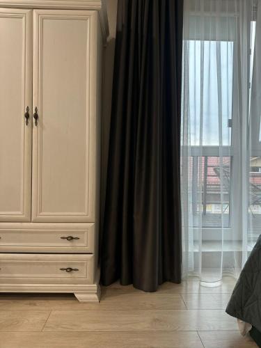 DHARMA Stay APARTAMENTAI su terasa ir vaizdu į miestą Self check-in