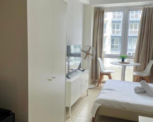 City View Condo in Pasig with Pool, WiFi and Netflix