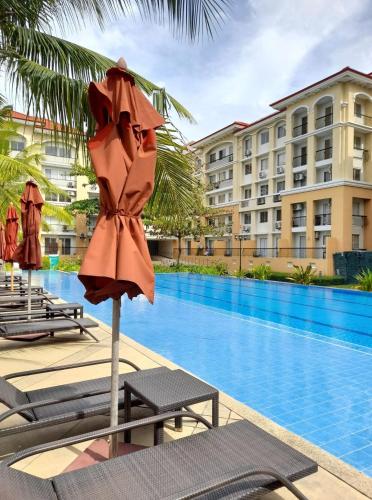 2BR Condo at Sanremo with Full Kitchen plus Free Fast&Unli Wi-Fi Complimentary Netflix plus Free Access to Pool