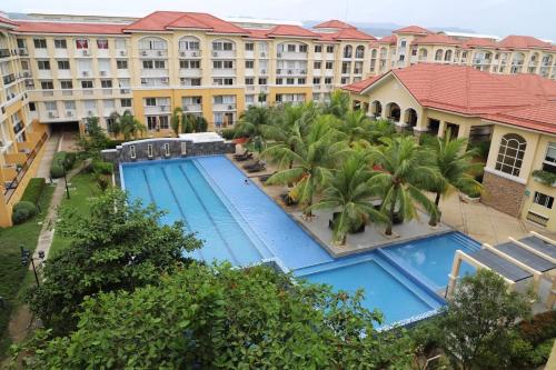 2BR Condo at Sanremo with Full Kitchen plus Free Fast&Unli Wi-Fi Complimentary Netflix plus Free Access to Pool