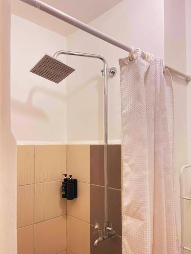 Charm's City Escape at Grace Residences