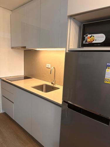 Blue Oikos Aesthetic 1BR Pool view in MOA