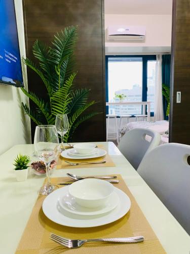 Tropical Chic Escape With City lights View- Modern Scandi