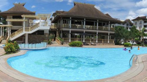 2BR Condo, One Oasis Ecoland Walk to SM City Davao, Pool & Gym Access