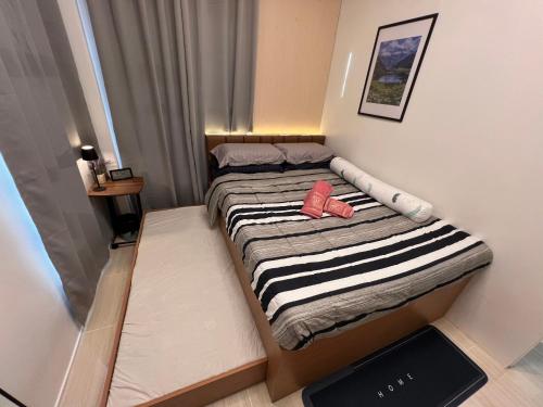 Seven-Eleven Inn 1BR Condo - Royal Oceancrest Mactan