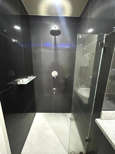 Deluxe room with king bed and Balcony at Kandi Palace