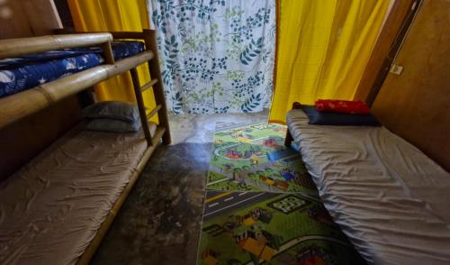 J Travel Trail Inn- Bed Space in Hubangon, Mahinog, Camiguin