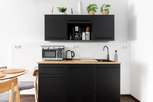 Global Living - Design Apartment I Rathausplatz I Kitchen I Augsburg