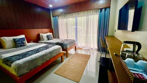 Southseas Beach Resort And Dive Center