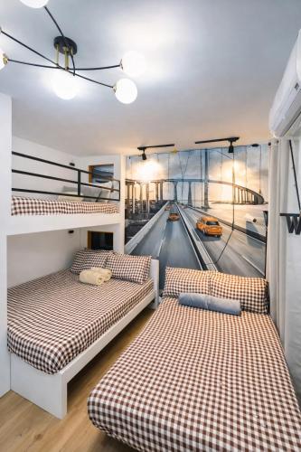 Antara-QueenBed-Balcony-HotShower-WorkCoffee Station-FullKitchen