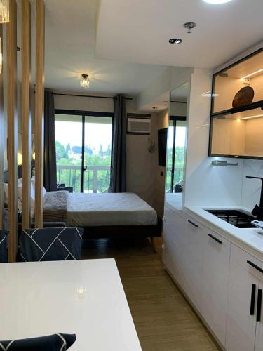 CozyVilla at Pine Suites Tagaytay 2BR or Studio with FREE PARKING 2br in Basement parking and studio in offsite parking