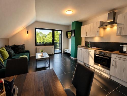 JUNIPRO Apartments & Rooms